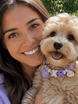 Dog and owner with custom beaded initial collar